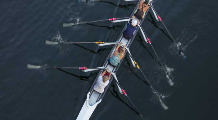 Female crew racers rowing, high angle view, Lake Union, Seattle, Washington, USA